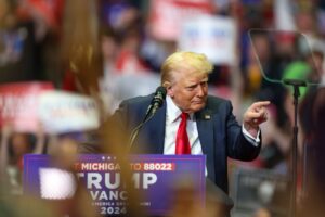 Trump pointing at a Grand Rapids farmer